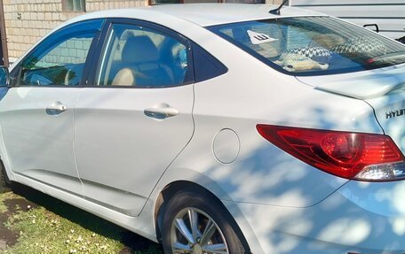 Hyundai Solaris II рестайлинг, 2011 год, 730 000 рублей, 20 фотография