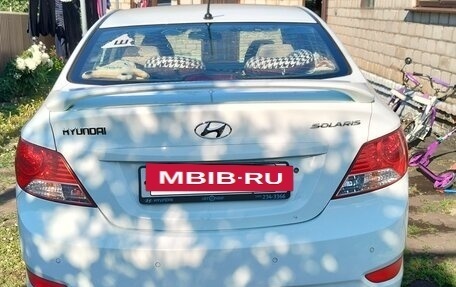 Hyundai Solaris II рестайлинг, 2011 год, 730 000 рублей, 19 фотография
