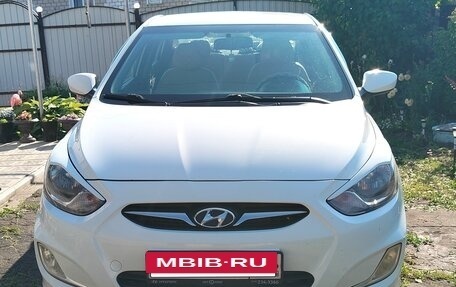 Hyundai Solaris II рестайлинг, 2011 год, 730 000 рублей, 15 фотография