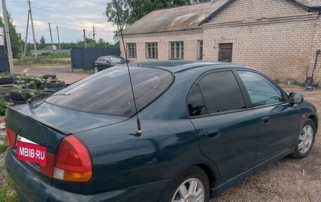 Mitsubishi Carisma I, 1996 год, 220 000 рублей, 6 фотография