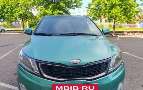 KIA Rio III рестайлинг, 2012 год, 560 000 рублей, 17 фотография