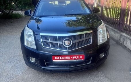 Cadillac SRX II рестайлинг, 2011 год, 400 000 рублей, 1 фотография