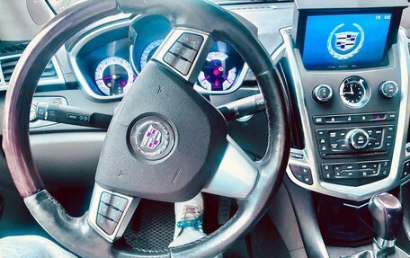 Cadillac SRX II рестайлинг, 2011 год, 400 000 рублей, 4 фотография