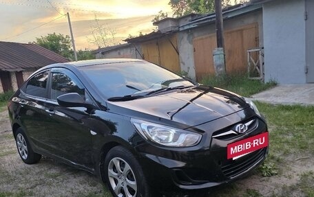 Hyundai Solaris II рестайлинг, 2011 год, 550 000 рублей, 3 фотография