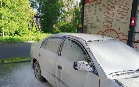 Toyota Avensis III рестайлинг, 1998 год, 155 000 рублей, 1 фотография