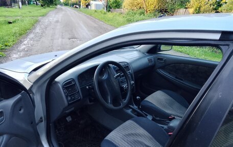 Toyota Avensis III рестайлинг, 1998 год, 155 000 рублей, 8 фотография