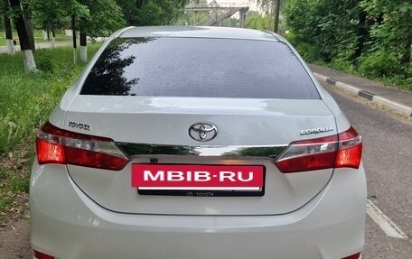 Toyota Corolla, 2014 год, 1 100 000 рублей, 14 фотография