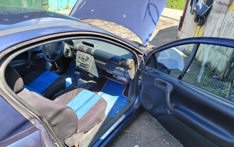 Opel Tigra, 1995 год, 200 000 рублей, 5 фотография