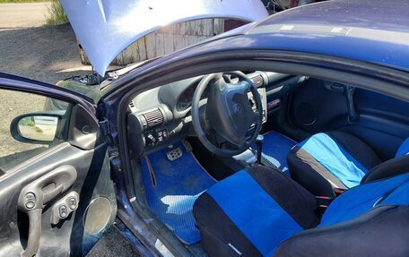 Opel Tigra, 1995 год, 200 000 рублей, 4 фотография