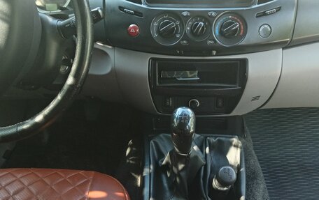 Mitsubishi L200 IV рестайлинг, 2011 год, 900 000 рублей, 7 фотография