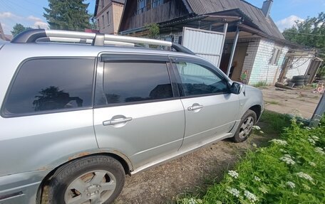 Mitsubishi Outlander III рестайлинг 3, 2003 год, 310 000 рублей, 18 фотография