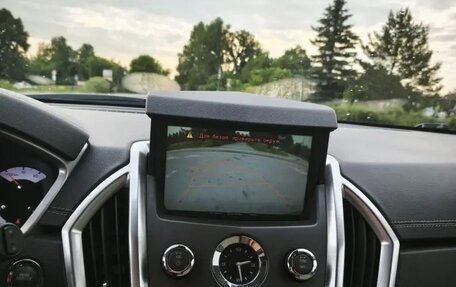 Cadillac SRX II рестайлинг, 2011 год, 920 000 рублей, 13 фотография