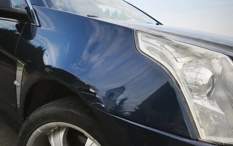 Cadillac SRX II рестайлинг, 2011 год, 920 000 рублей, 14 фотография