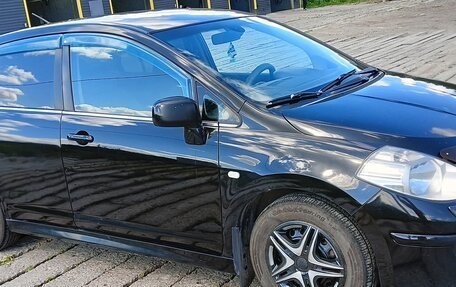 Nissan Tiida, 2010 год, 700 000 рублей, 5 фотография