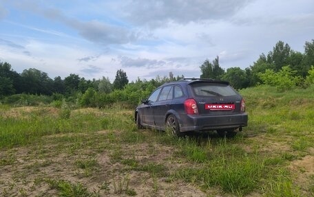 Mazda Protege, 2001 год, 150 000 рублей, 8 фотография
