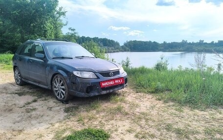 Mazda Protege, 2001 год, 150 000 рублей, 10 фотография
