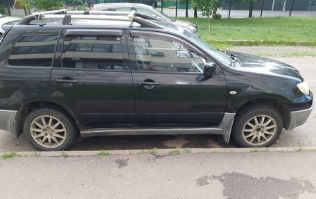 Mitsubishi Outlander III рестайлинг 3, 2007 год, 370 000 рублей, 2 фотография
