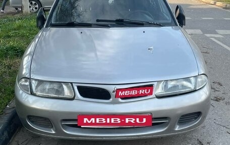 Mitsubishi Carisma I, 1999 год, 300 000 рублей, 9 фотография