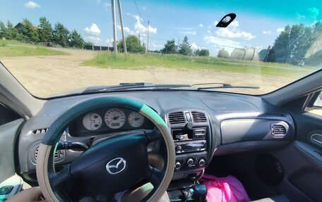 Mazda 323, 2003 год, 210 000 рублей, 13 фотография