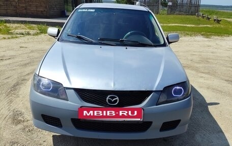 Mazda 323, 2003 год, 210 000 рублей, 5 фотография
