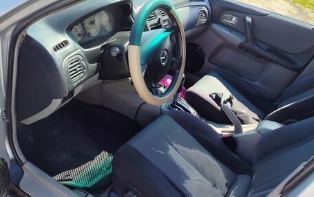 Mazda 323, 2003 год, 210 000 рублей, 15 фотография