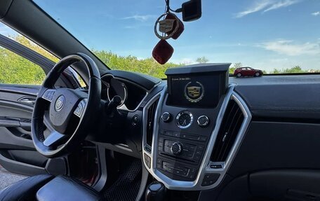 Cadillac SRX II рестайлинг, 2010 год, 930 000 рублей, 4 фотография
