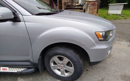 Mitsubishi Outlander III рестайлинг 3, 2011 год, 1 350 000 рублей, 12 фотография