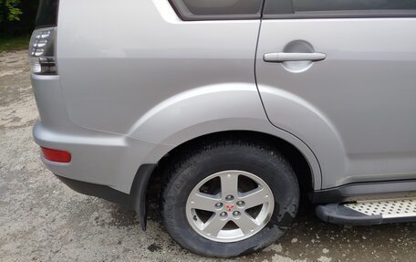 Mitsubishi Outlander III рестайлинг 3, 2011 год, 1 350 000 рублей, 13 фотография