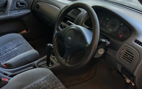Ford Laser IV, 1999 год, 110 000 рублей, 9 фотография