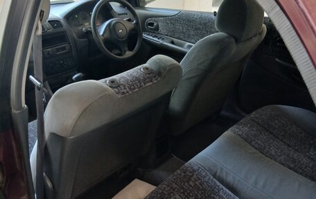 Ford Laser IV, 1999 год, 110 000 рублей, 11 фотография
