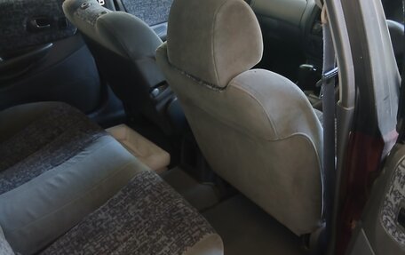 Ford Laser IV, 1999 год, 110 000 рублей, 12 фотография