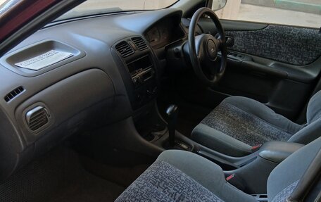 Ford Laser IV, 1999 год, 110 000 рублей, 10 фотография