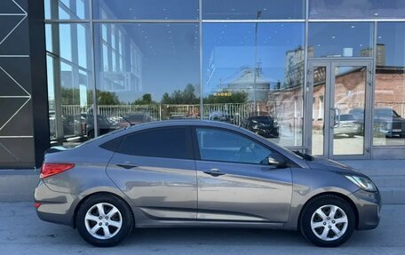 Hyundai Solaris II рестайлинг, 2011 год, 800 000 рублей, 4 фотография
