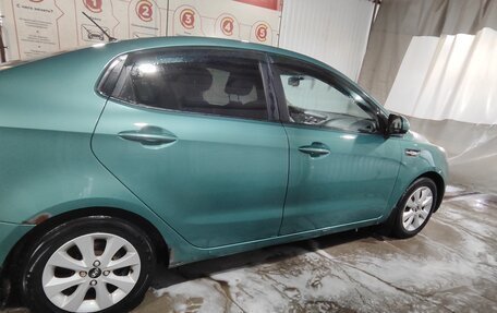 KIA Rio III рестайлинг, 2013 год, 670 000 рублей, 21 фотография
