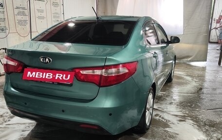 KIA Rio III рестайлинг, 2013 год, 670 000 рублей, 22 фотография