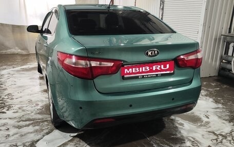 KIA Rio III рестайлинг, 2013 год, 670 000 рублей, 17 фотография