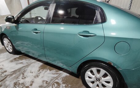 KIA Rio III рестайлинг, 2013 год, 670 000 рублей, 24 фотография