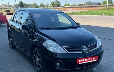 Nissan Tiida, 2010 год, 440 000 рублей, 8 фотография