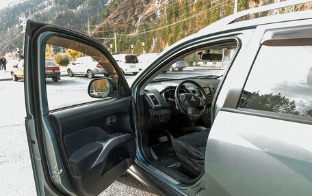 Mitsubishi Outlander III рестайлинг 3, 2008 год, 700 000 рублей, 18 фотография