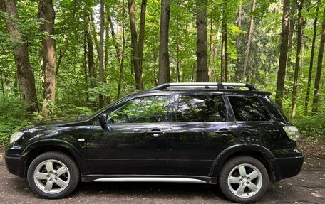 Mitsubishi Outlander III рестайлинг 3, 2007 год, 670 000 рублей, 2 фотография