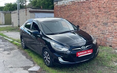 Hyundai Solaris II рестайлинг, 2011 год, 585 000 рублей, 9 фотография