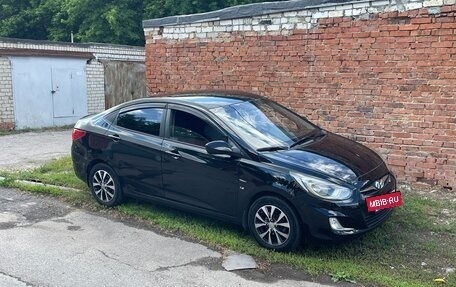 Hyundai Solaris II рестайлинг, 2011 год, 585 000 рублей, 10 фотография