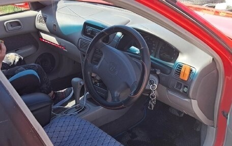 Toyota Corolla, 1999 год, 2 фотография