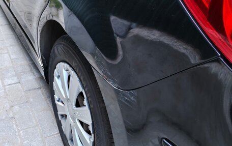 Nissan Tiida, 2011 год, 670 000 рублей, 12 фотография