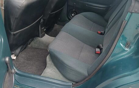Mazda 323, 1995 год, 150 000 рублей, 10 фотография