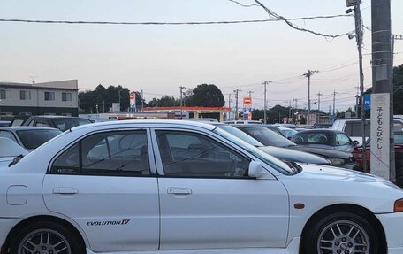 Mitsubishi Lancer Evolution IV, 1996 год, 3 000 000 рублей, 4 фотография