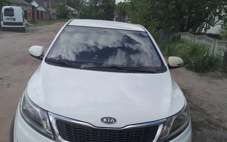 KIA Rio III рестайлинг, 2012 год, 650 000 рублей, 1 фотография