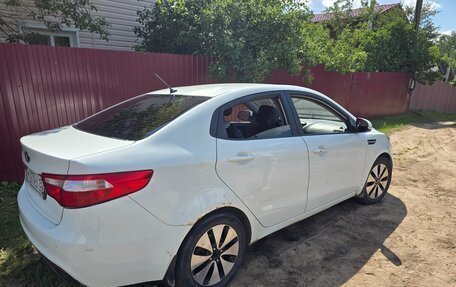 KIA Rio III рестайлинг, 2013 год, 700 000 рублей, 12 фотография