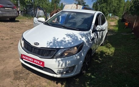 KIA Rio III рестайлинг, 2013 год, 700 000 рублей, 16 фотография