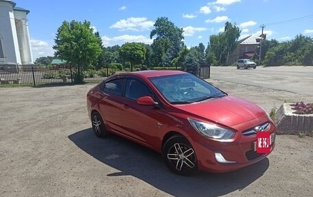 Hyundai Solaris II рестайлинг, 2011 год, 740 000 рублей, 9 фотография